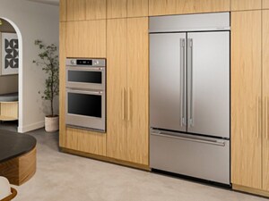 A KitchenAid® Built-In Refrigerator and Wall Oven, surrounded by cabinetry