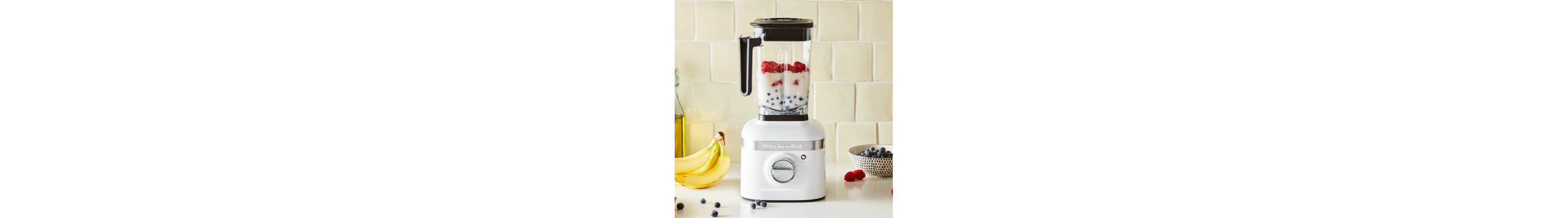 White KitchenAid® blender blending smoothie ingredients