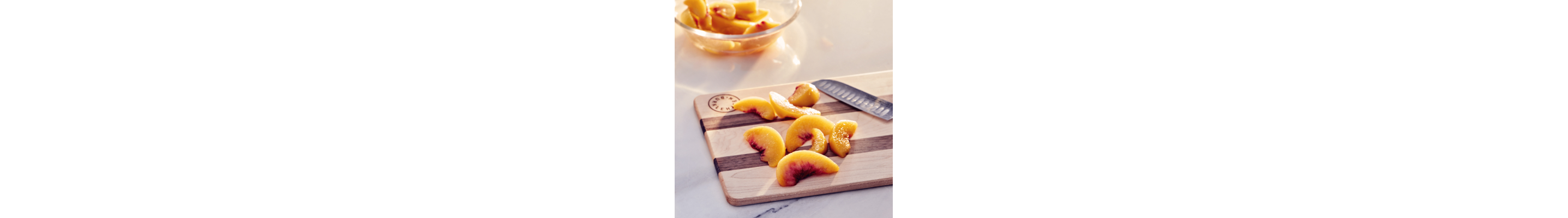 Peaches on a cutting board