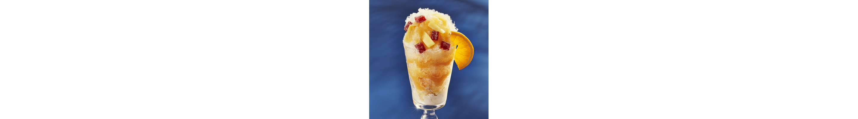 Shaved ice dessert with fruit syrup and various toppings 