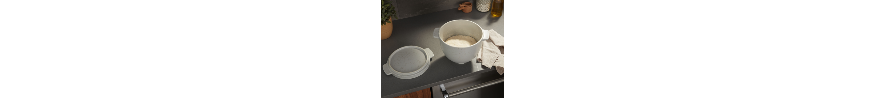 Bread dough inside a KitchenAid® Bread Bowl with Lid 