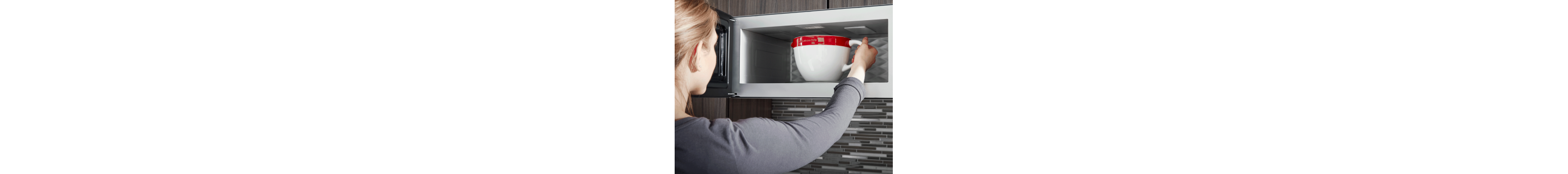 Bowl being placed inside a microwave