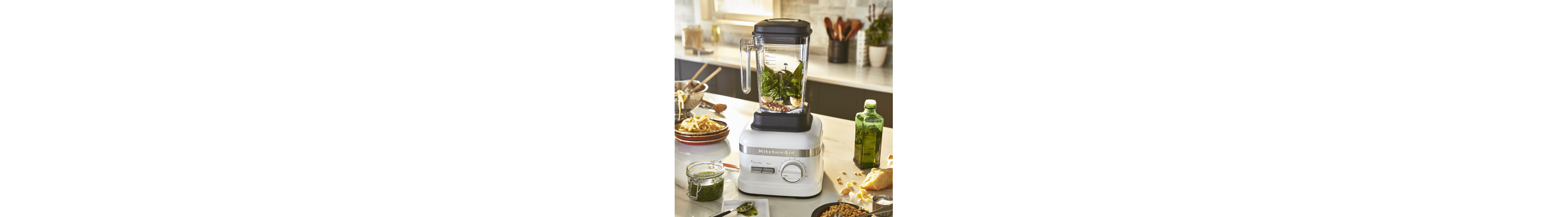 Chimichurri ingredients inside a KitchenAid® blender
