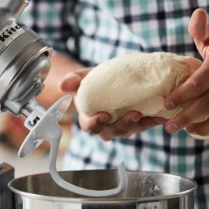 Pasta dough mixer outlet