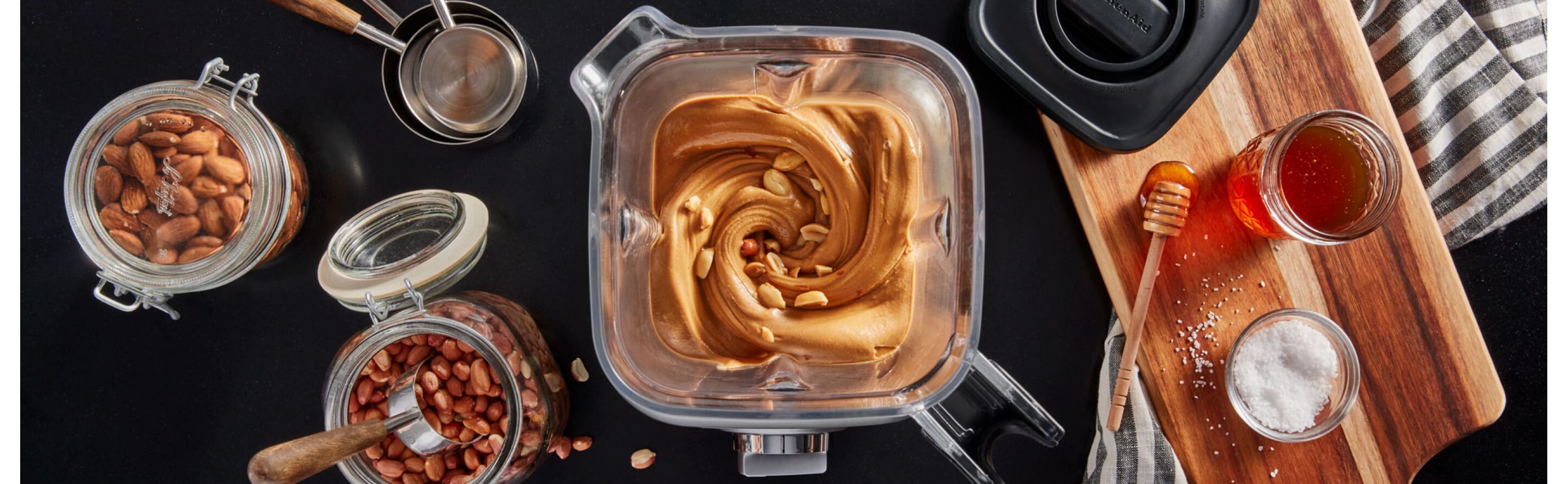 Blender filled with homemade peanut butter
