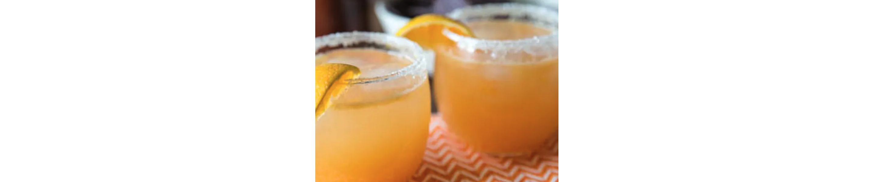 Citrus margaritas with orange garnish