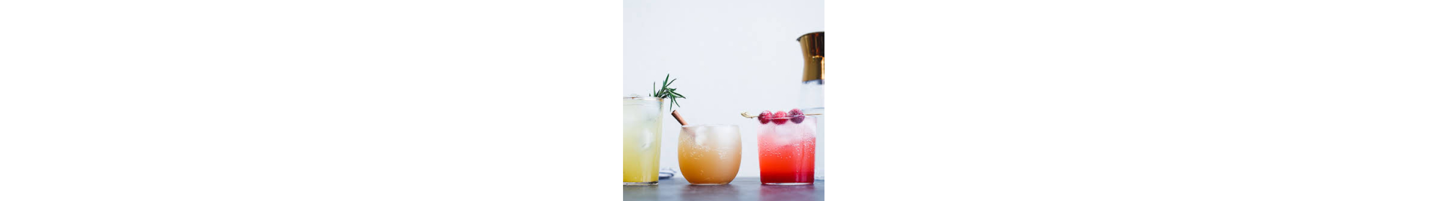 Three different fruit juices in a row