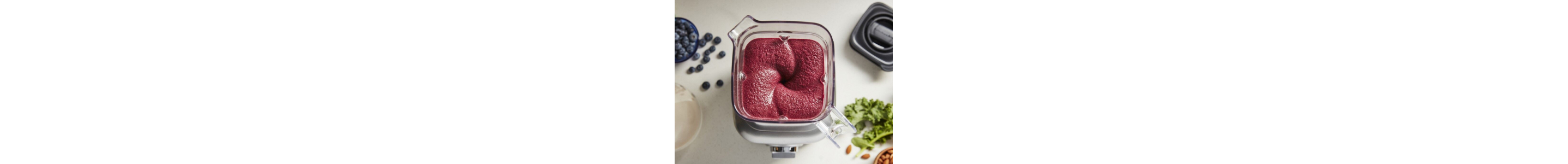 A KitchenAid® blender with a blended fruit mixture