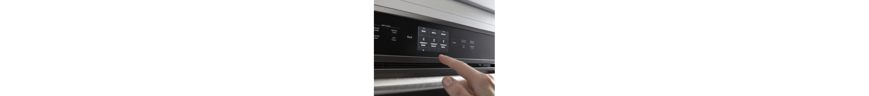 Hand making an oven selection