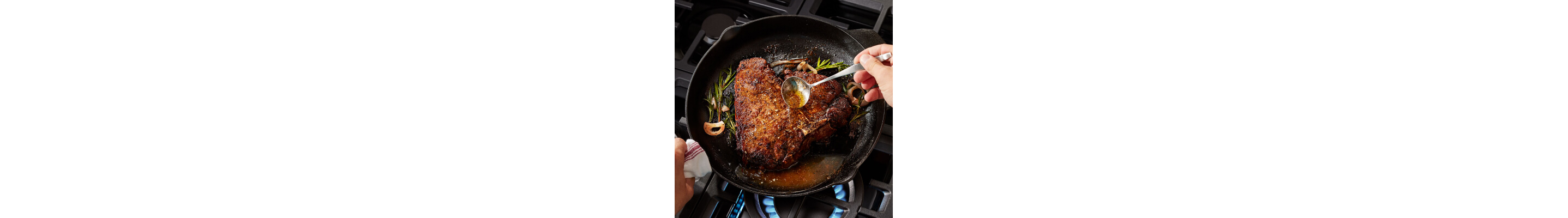 Person basting steak