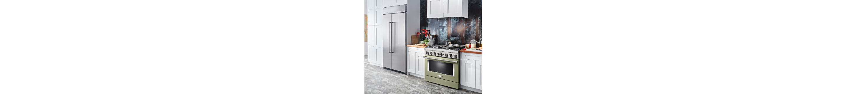  Kitchen with olive green stove, white cabinetry and french door refrigerator with ingredients on countertop