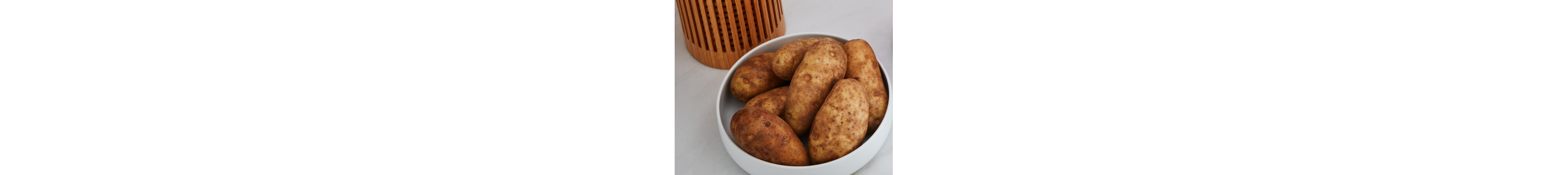 A bowl of skin-on potatoes