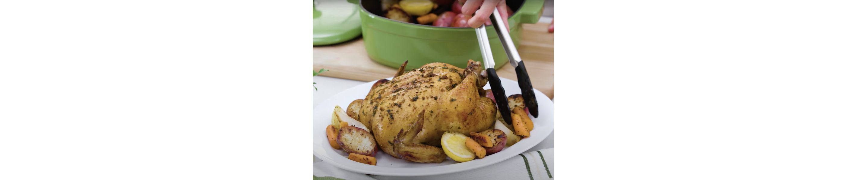 Whole roasted chicken on a plate