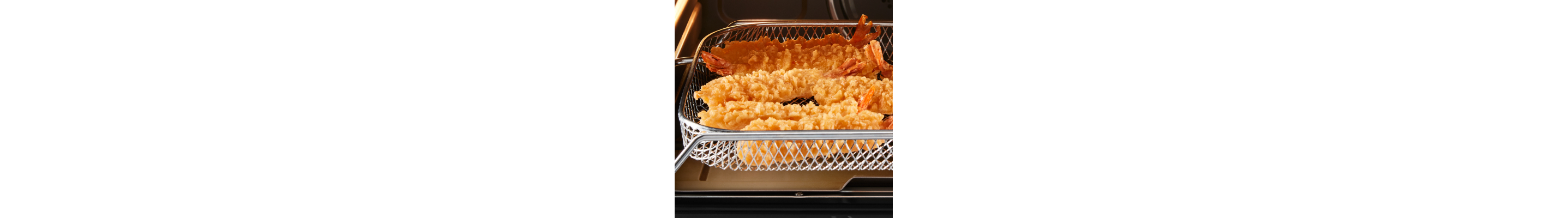 Shrimp in air fry basket.