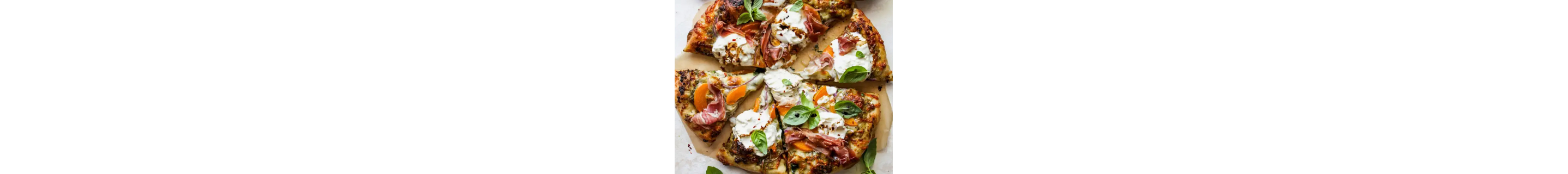Cut pizza on a cutting board