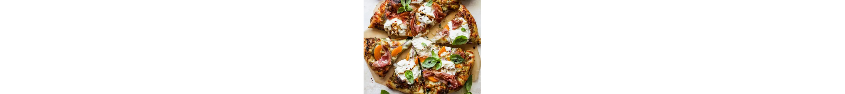 Cut pizza on a cutting board
