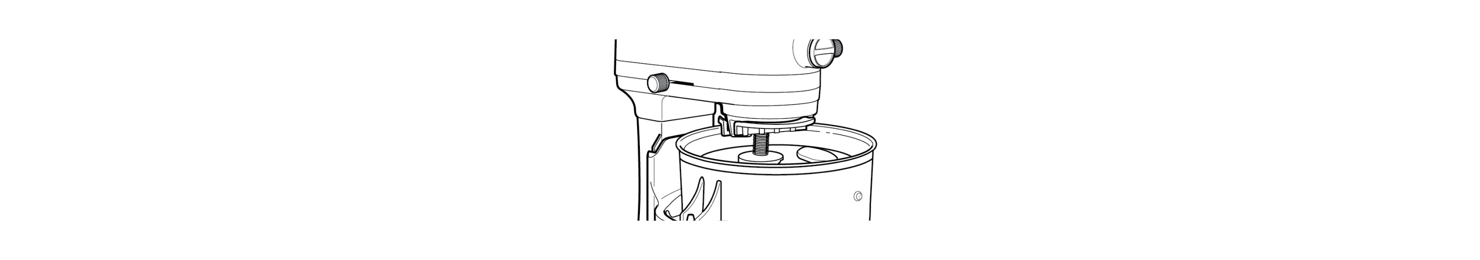 Freeze bowl being lifted into position on stand mixer