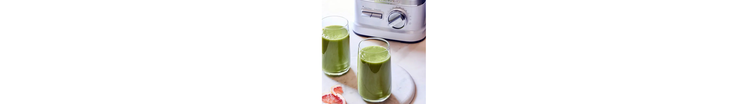 Green smoothies on a counter