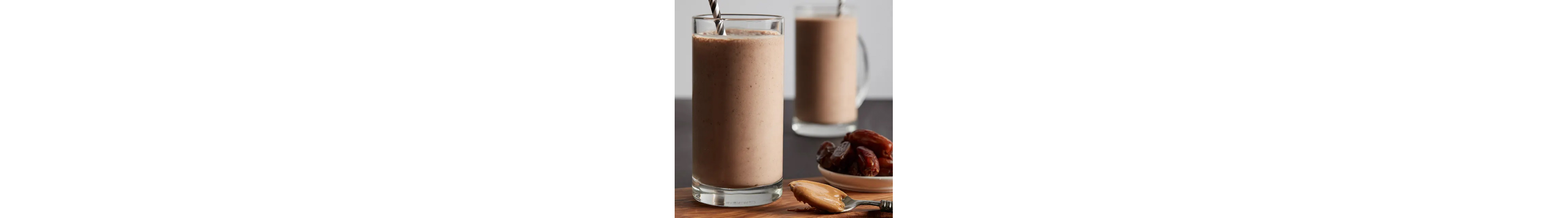 Two brown smoothies with straws
