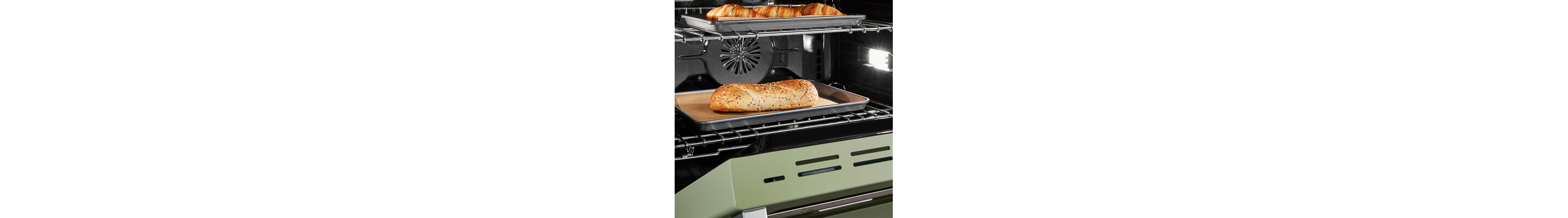 Food on baking sheet in an oven