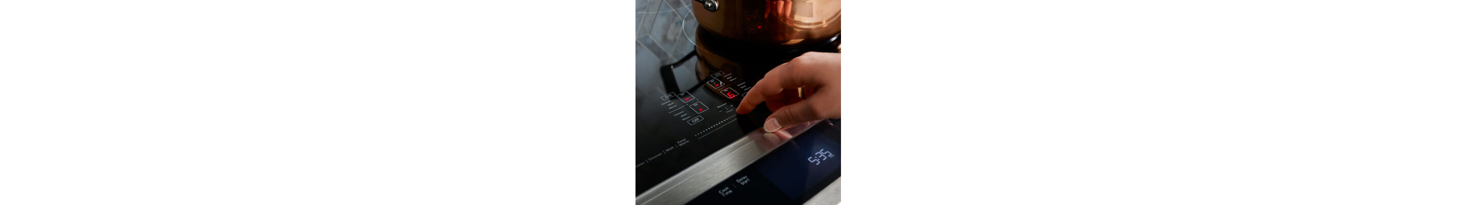 Person making selection on range control panel