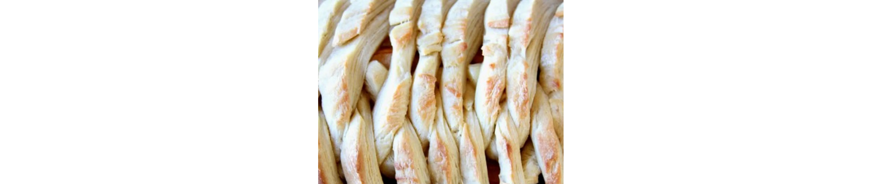 Close-up of fresh pear and fig danish braid pastry