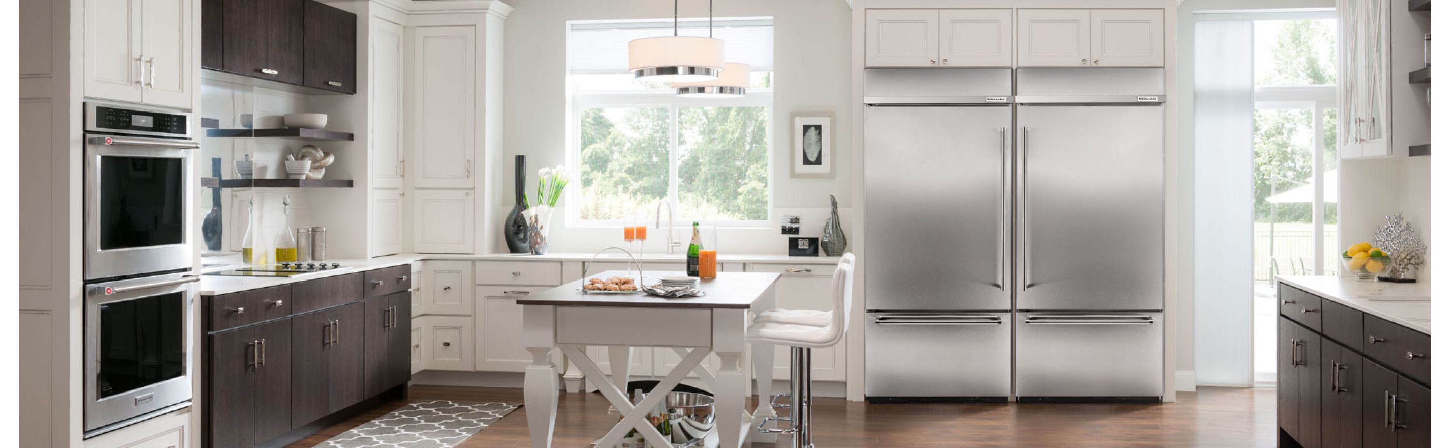 A kitchen featuring a KitchenAid® large capacity refrigerator