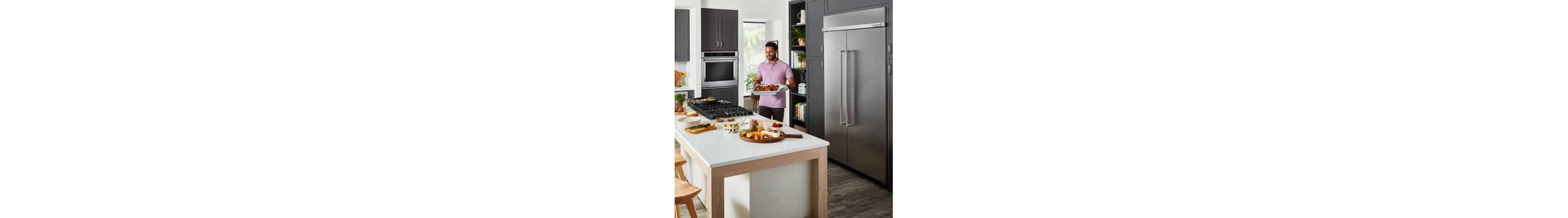A kitchen that fits a KitchenAid® large capacity refrigerator 