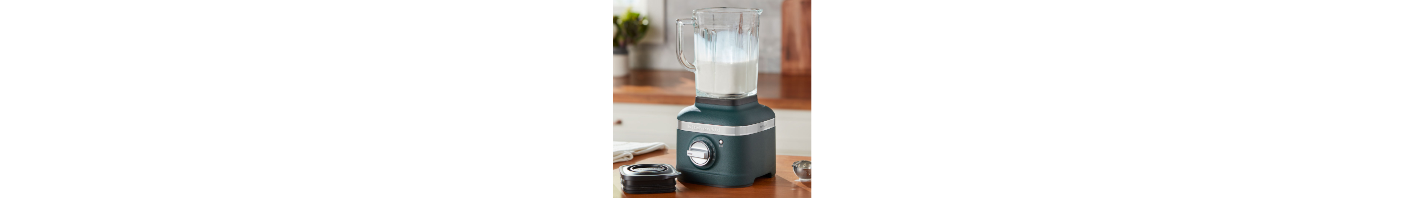 KitchenAid® blender with heavy cream in the blender jar