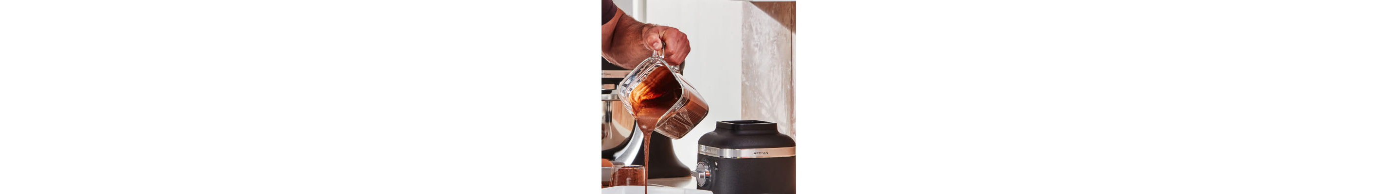Person pouring from KitchenAid® blender