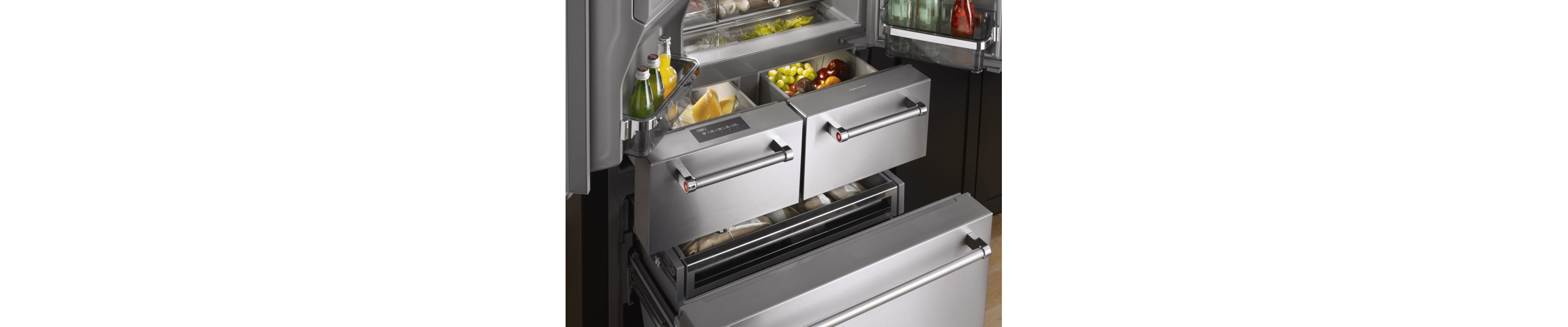 Humidity-controlled crisper drawers in a KitchenAid® refrigerator.