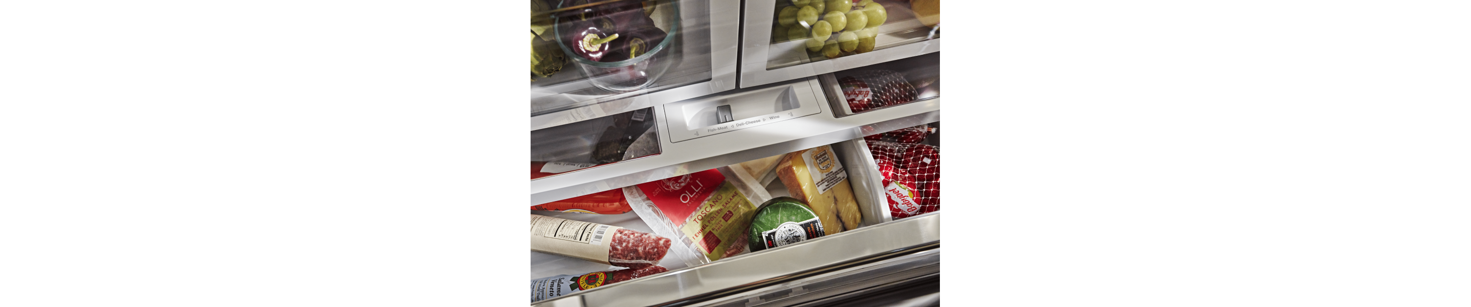 Various meats and cheeses in a FreshChill™ Temperature-Controlled drawer.
