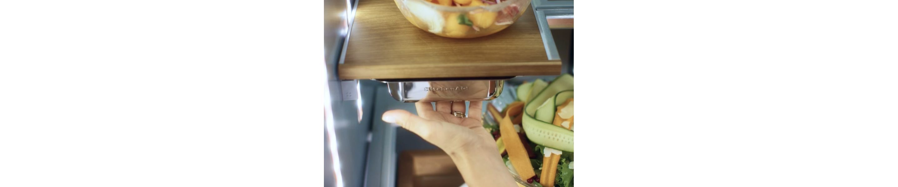 A slide-out drawer from KitchenAid brand.