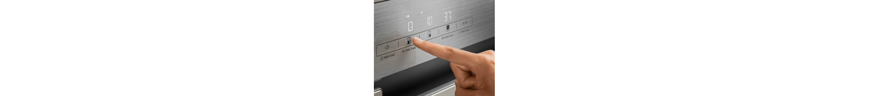 Person selecting refrigerator temperature setting