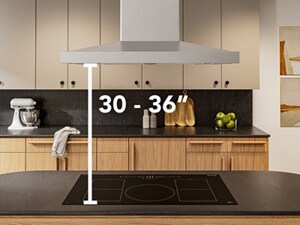Diagram overlay of height recommendation for range hood above induction cooktop