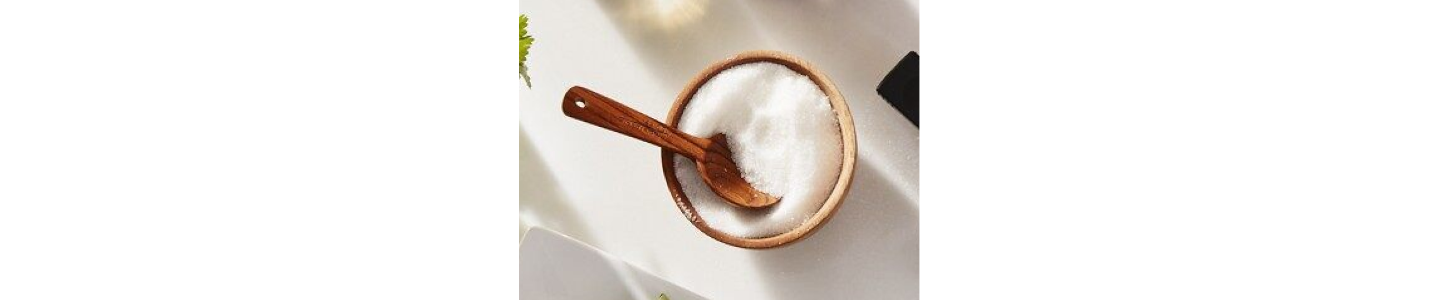 Wooden bowl filled with salt