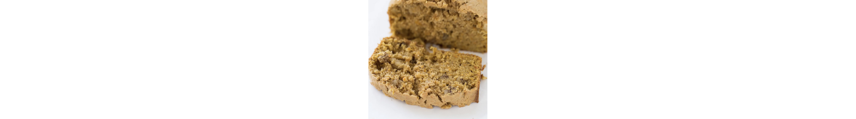 Slice of browned butter sweet potato bread with walnuts