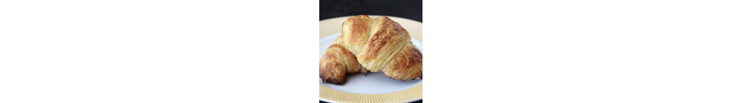 Croissants on a serving plate