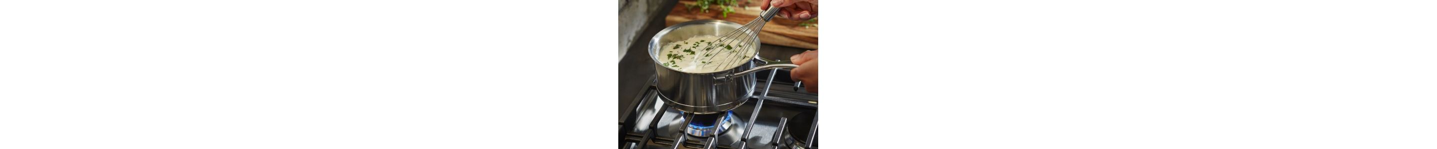 Whisk in saucepan over all-purpose gas burner