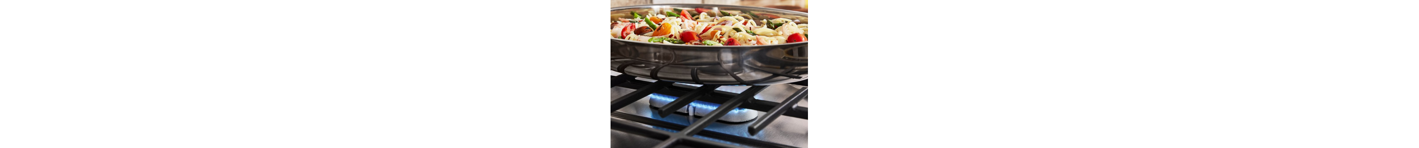 Food cooking over oval gas burner