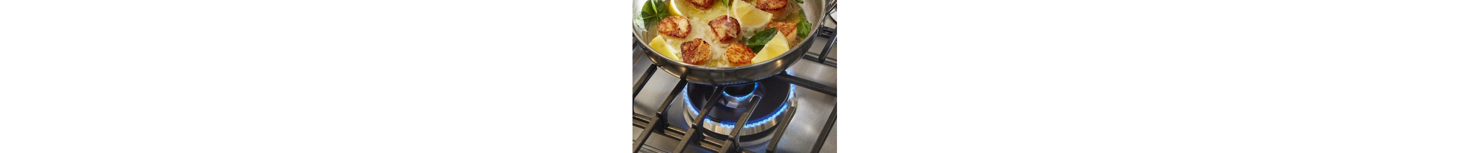 Food cooking over dual-ring gas burner