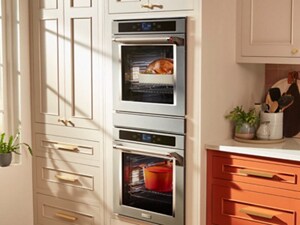 Double wall ovens in a bright kitchen