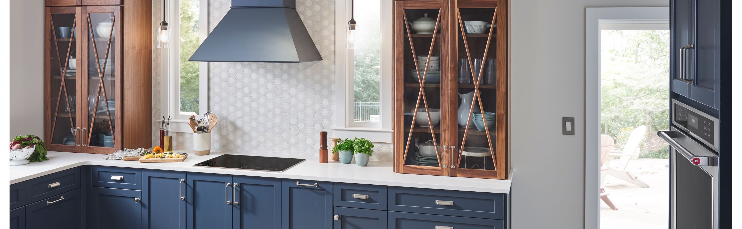 KitchenAid® cooktop and range hood in a modern kitchen