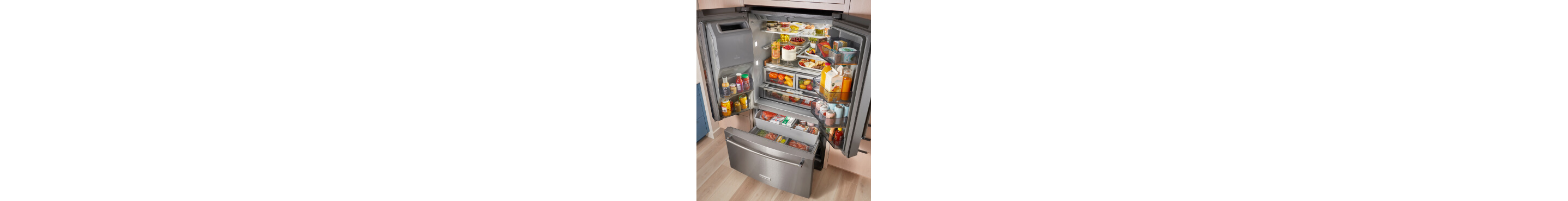Open French door refrigerator filled with groceries