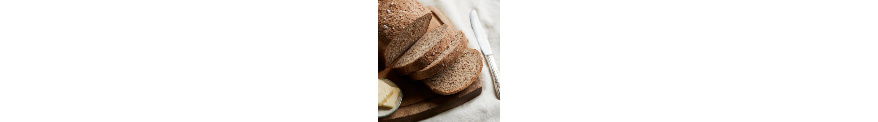 Sprouted bread next to a butter knife