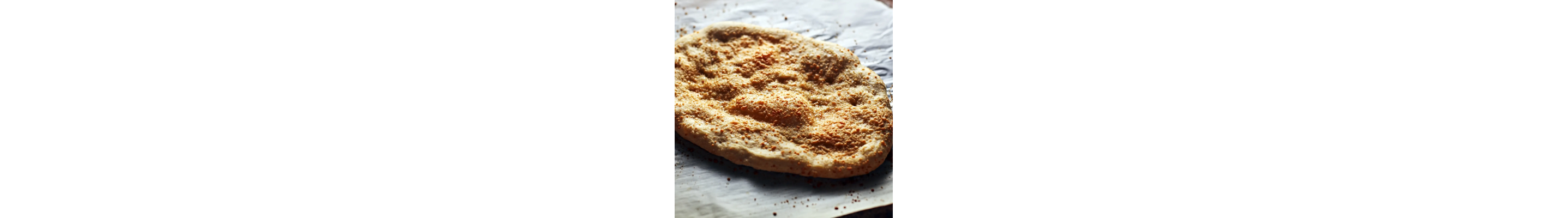 Flatbread topped with herbs