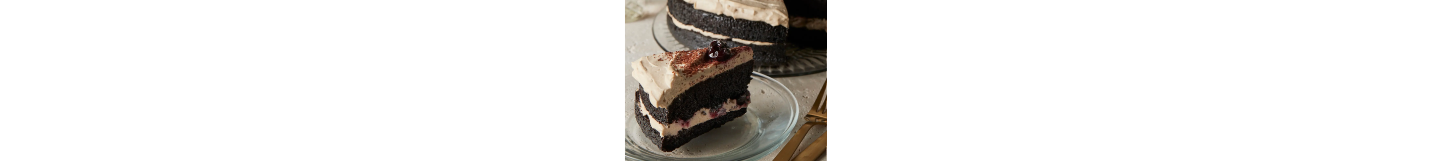 Frosting on a two-layer chocolate cake