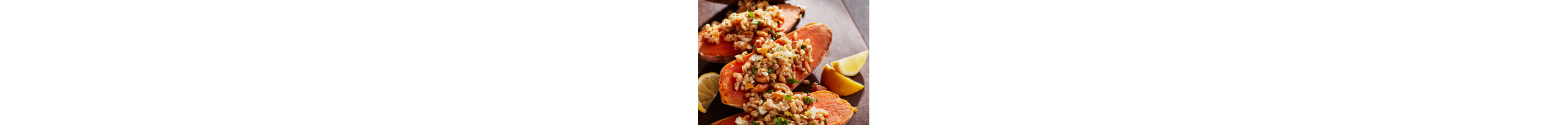 Several steamed sweet potatoes stuffed with rice.