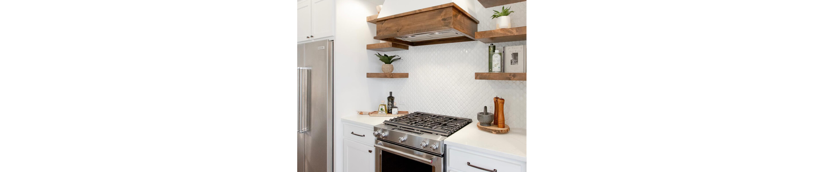 A white color scheme in a kitchen with KitchenAid® appliances