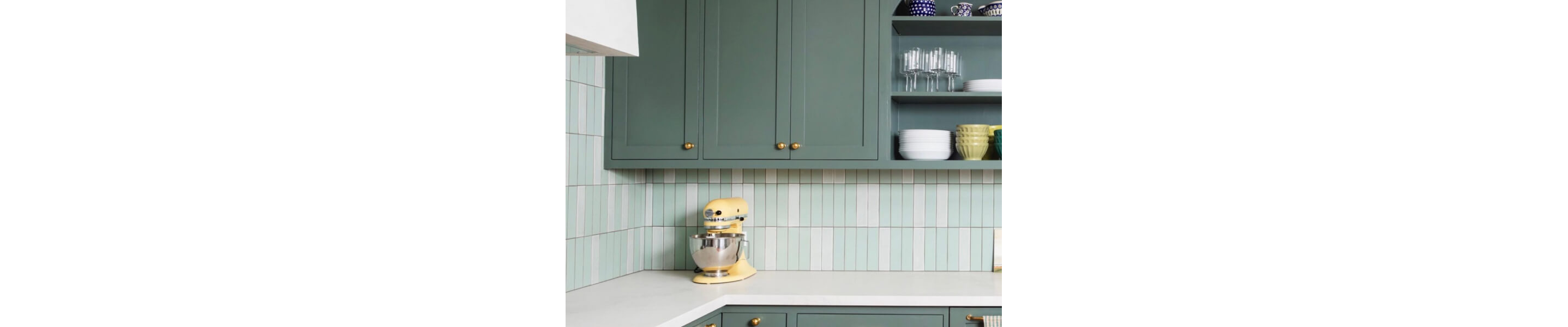 Blue/green cabinets in a kitchen
